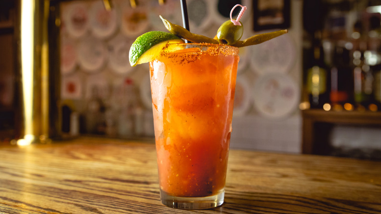 Bloody Mary cocktail on a wooden surface