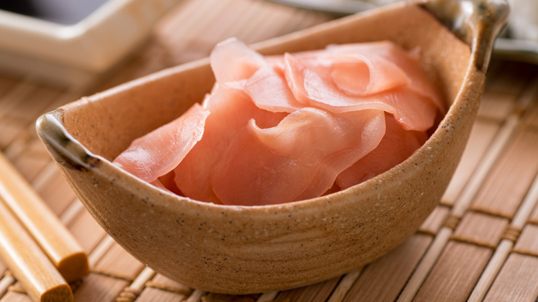 A bowl of light pink pickled ginger