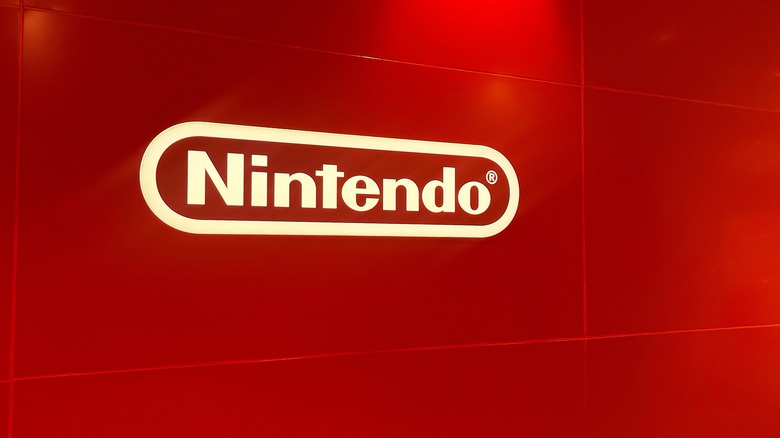 A red wall with the Nintendo logo on it.