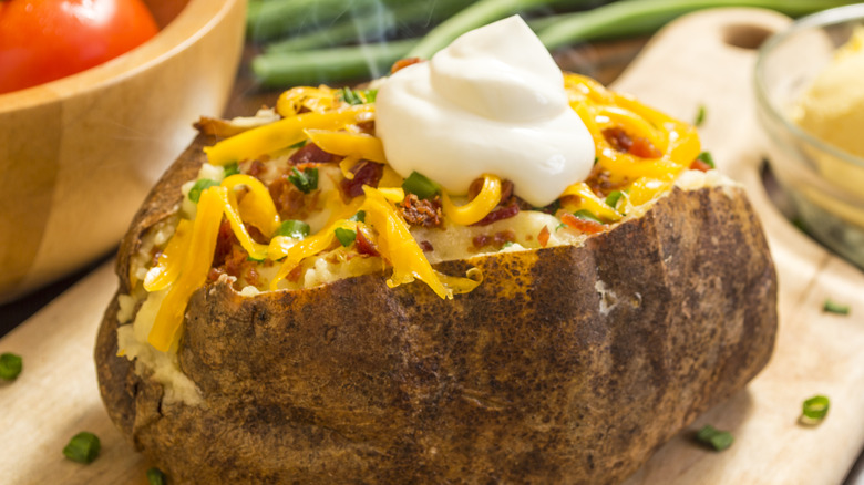 Baked potato with many toppings