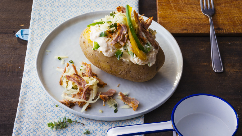 Baked potato loaded with toppings