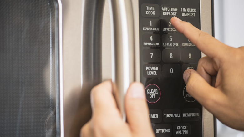 Close-up of microwave buttons