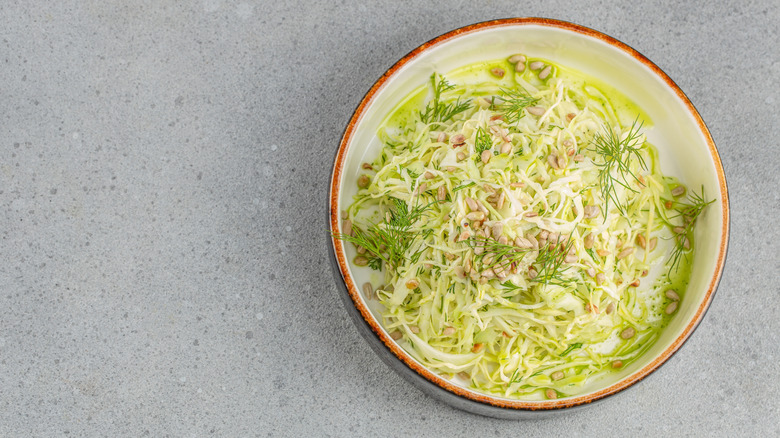 A serving of coleslaw in a bowl.