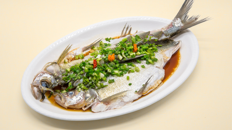 Chinese steamed white fish with green onions