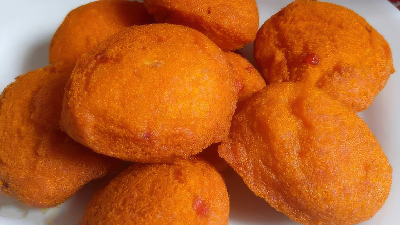 A plate of bean fritters that resembles Amara from Nigeria, but they're a bit larger