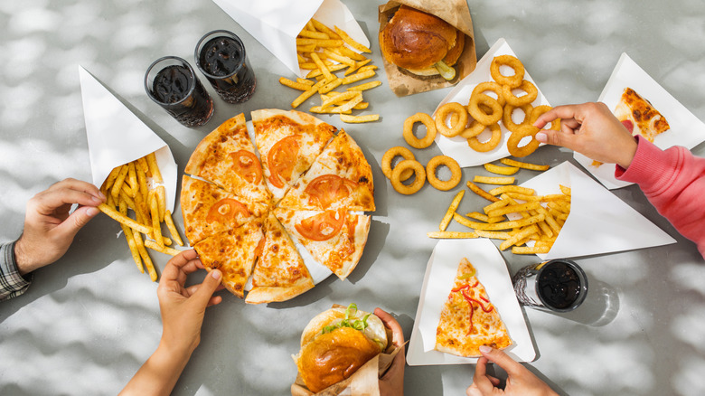 fast food pizza fries onion rings and burgers