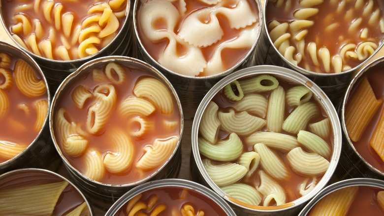 Top view of cans with various types of pasta in them