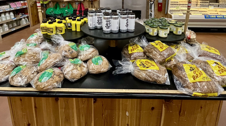 Loaves of Trader Joe's bread sitting on a table.