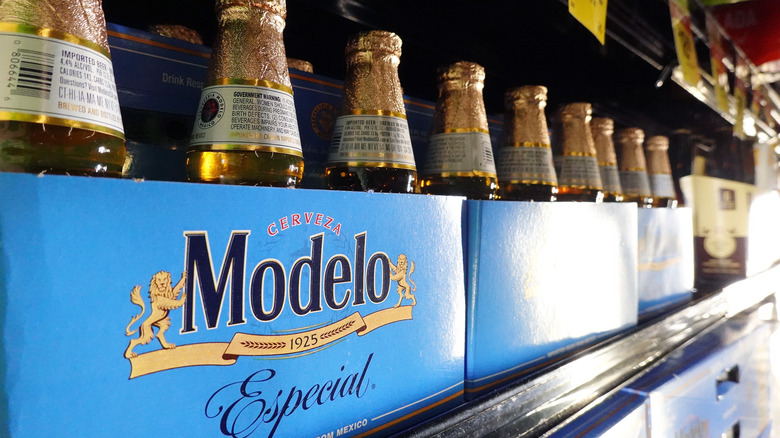 A store shelf with bottles of Modelo Especial on it