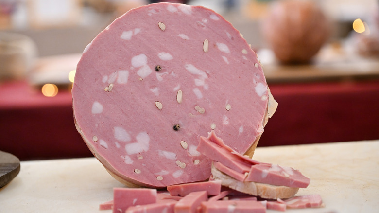 Italian log of fresh mortadella with chunks