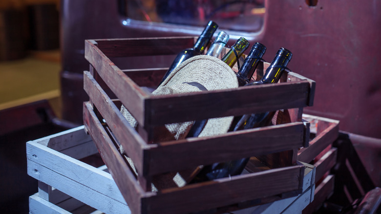 Wooden crate with bottles