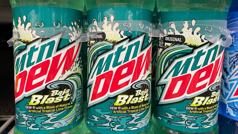 Bottles of Baja Blast in a grocery store six pack.