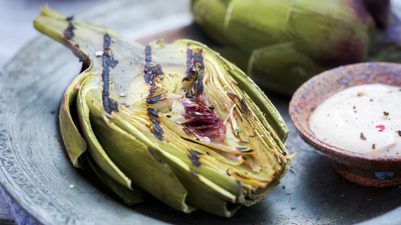 Grilled artichoke with dipping sauce