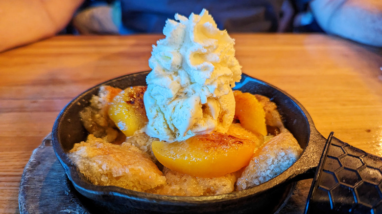 peach cobbler with whipped cream