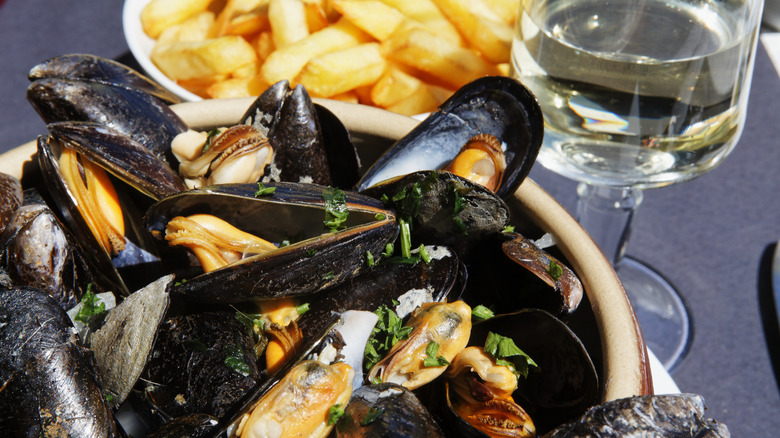 A platter of cooked mussels