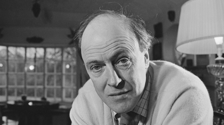 Roald Dahl posing for the camera.