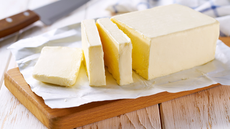 Sliced pieces of butter on a table