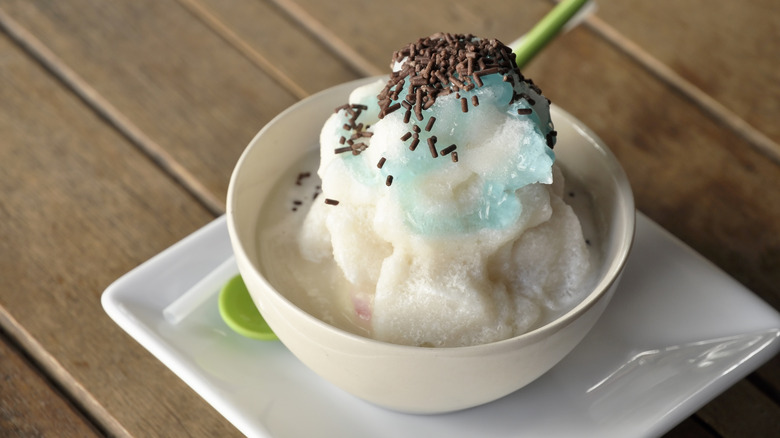 A bowl of snow cream served in a restaurant.