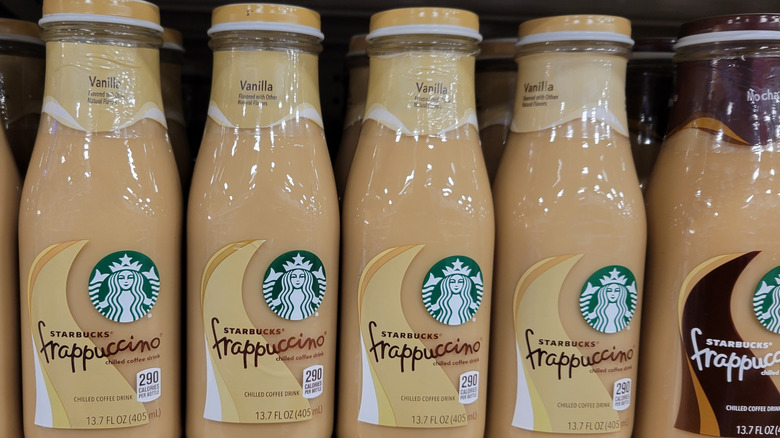 A row of Vanilla and Mocha-flavored Starbucks Frappuccinos at a grocery store.