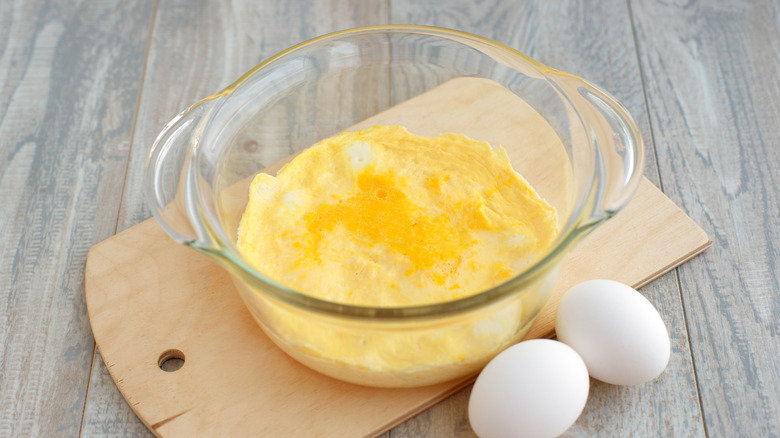 a cooked egg in a glass bowl