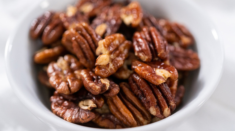 A bowl of toasted pecans