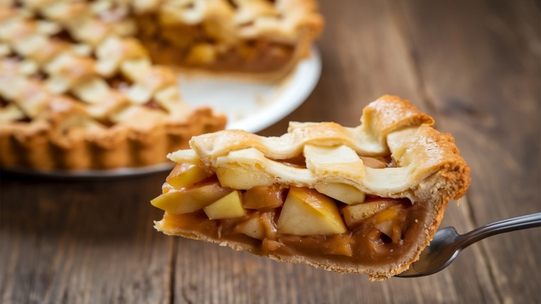 A closeup of a slice of homemade apple pie